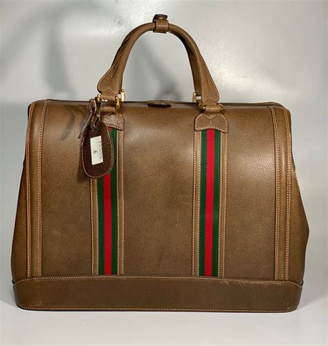 borsa da viaggio in pelle signature verde gucci